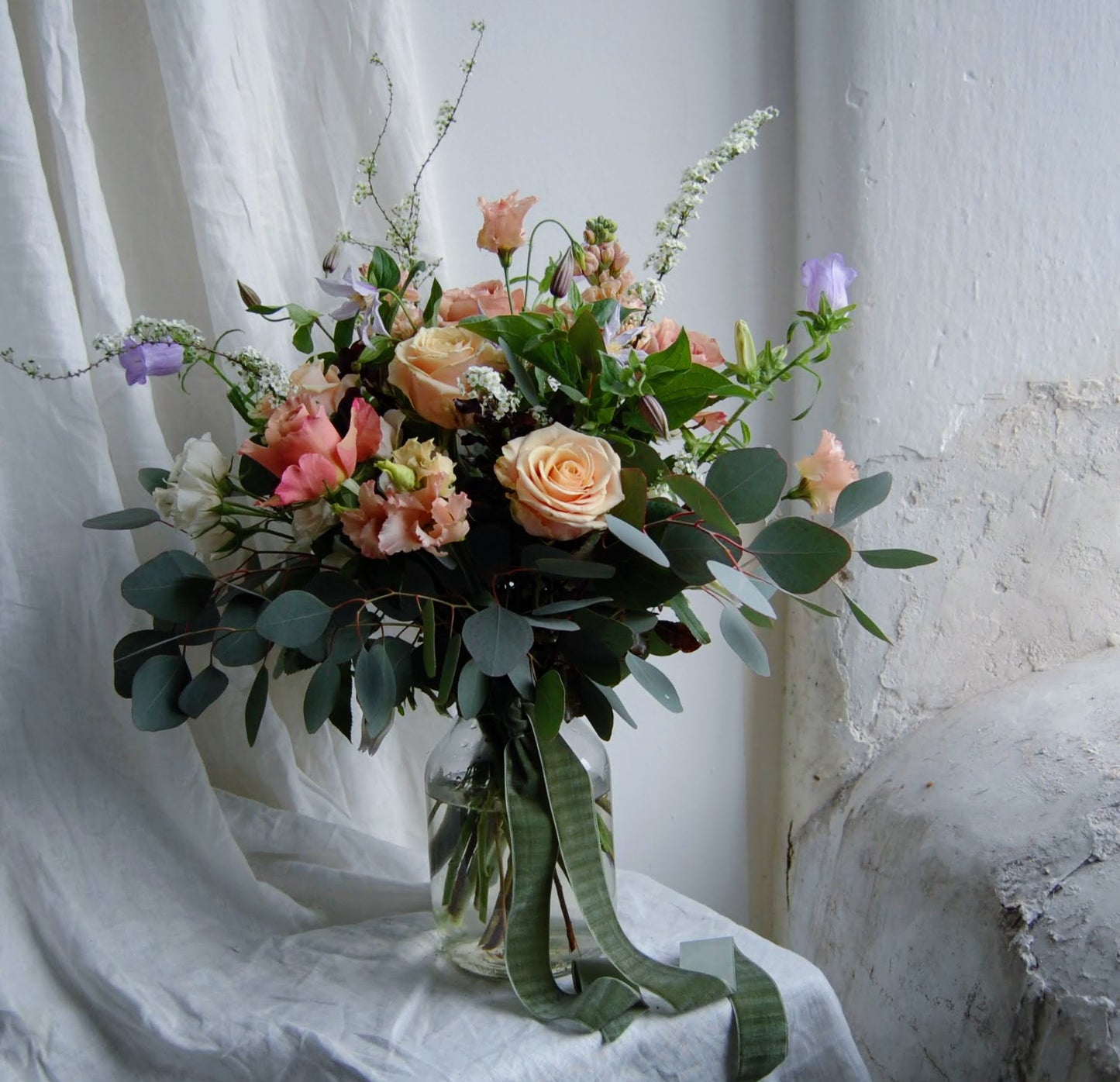 Florist choice arrangement in pickle jar with water